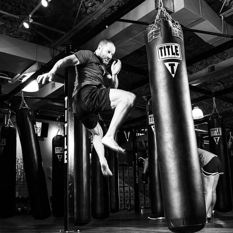 Mixed Martial Arts Lessons for Adults in Stafford VA - Flying Knee Black and White MMA